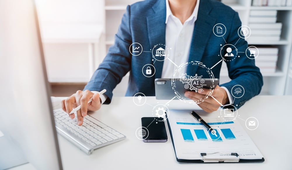 digital transformation man using laptop_shutterstock_2314954851