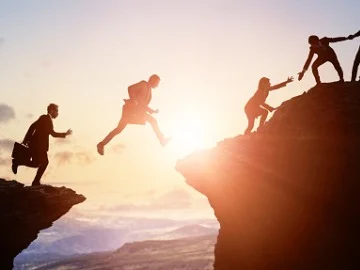 challenge-of-business-concept-group-of-businesspeople-climbing-a-picture-id1321461747