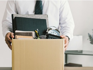 resignation-businessmen-holding-boxes-for-personal-belongings-and-a-picture-id1341022597
