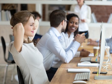 smiling-businesswoman-relaxing-leaning-back-in-office-chair-picture-id1092645766